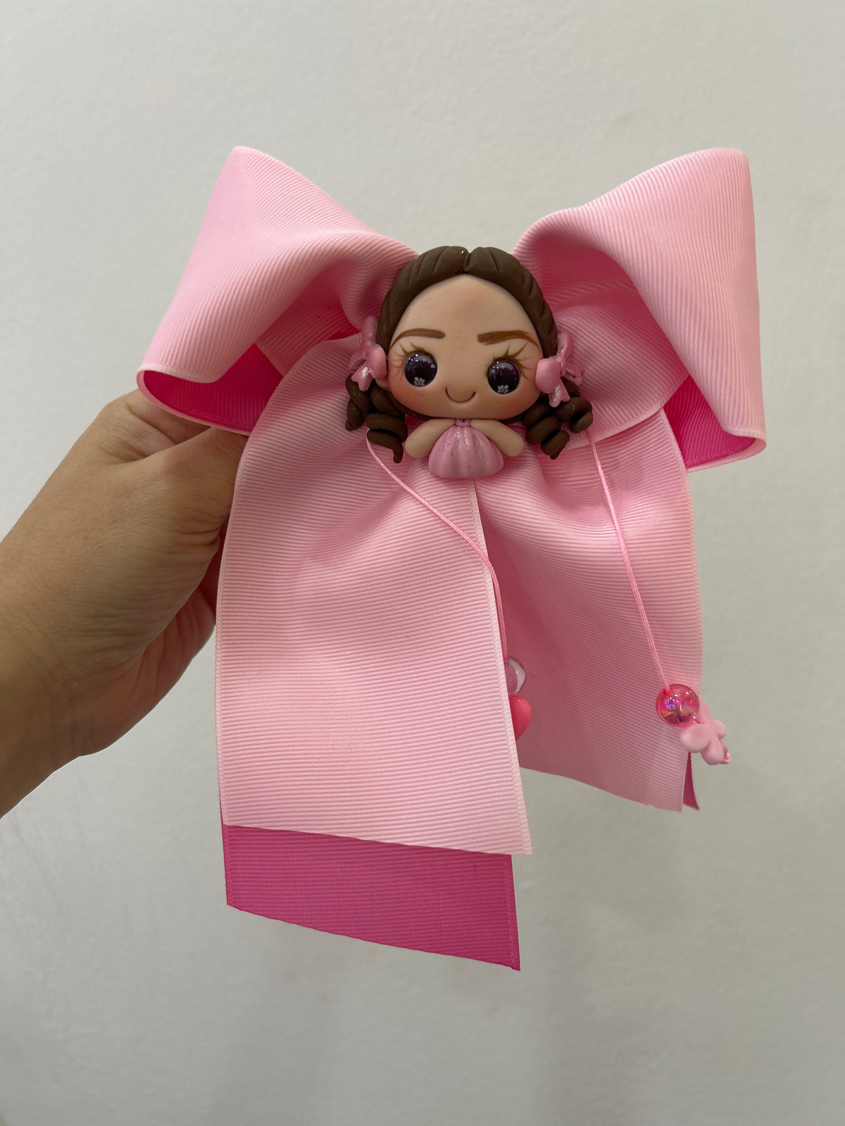 Moño muñeca