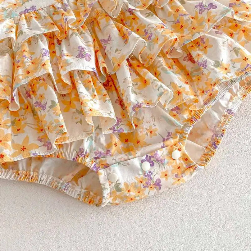 Pañalero flores naranjas