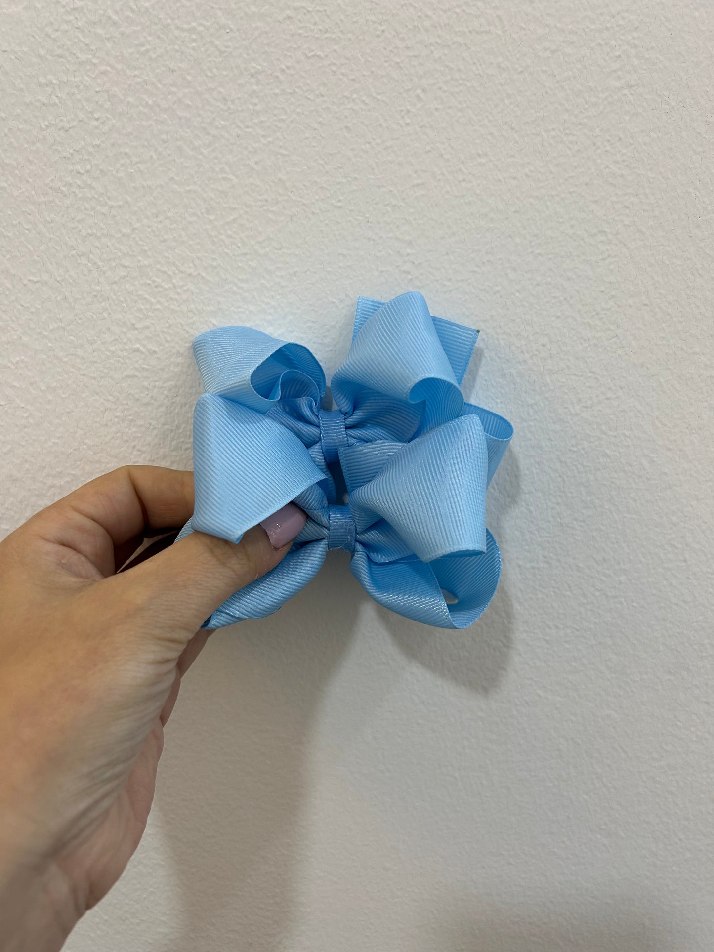 Moño par mediano liso