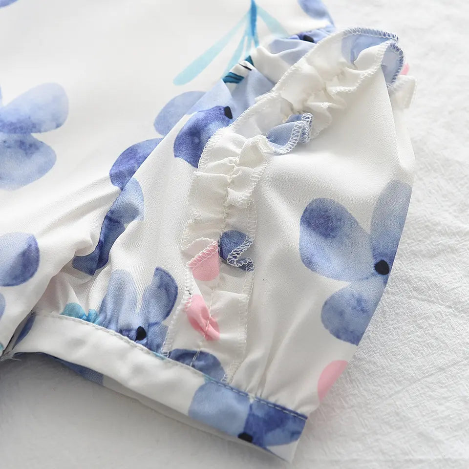 Vestido blanco con flores azules