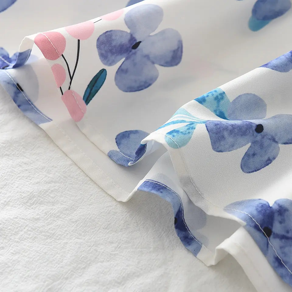 Vestido blanco con flores azules