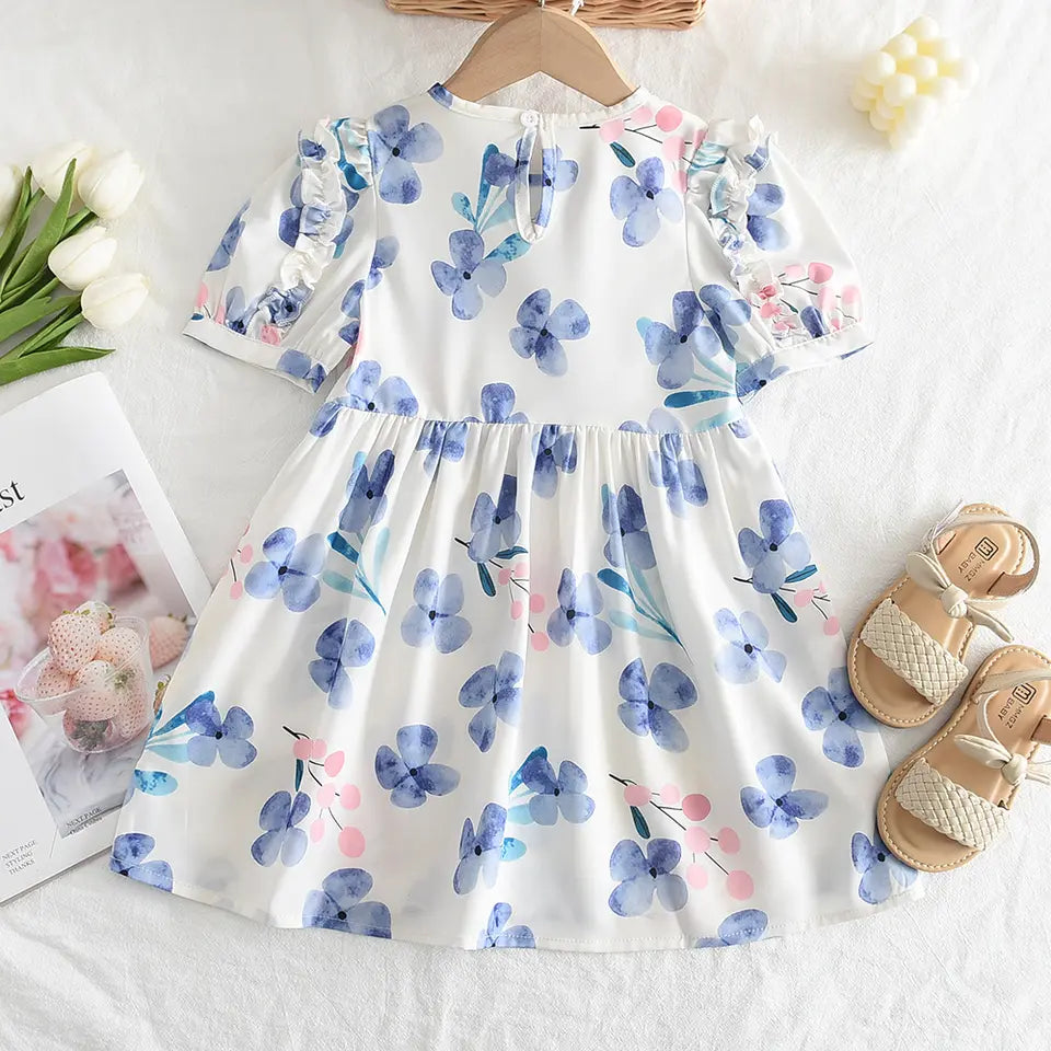 Vestido blanco con flores azules