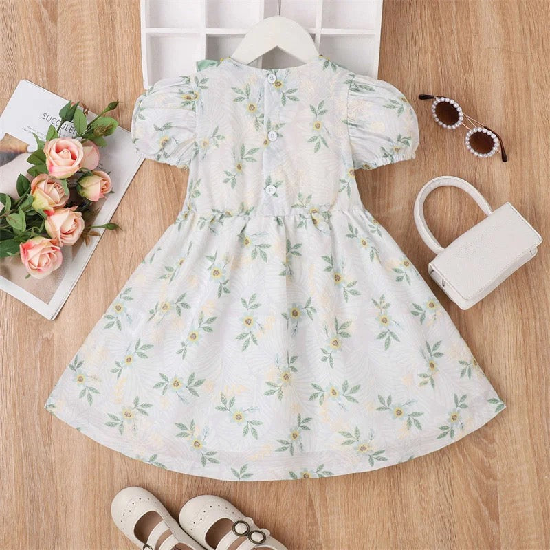 Vestido blanco con flores verdes