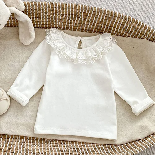 Blusa blanca con solapa