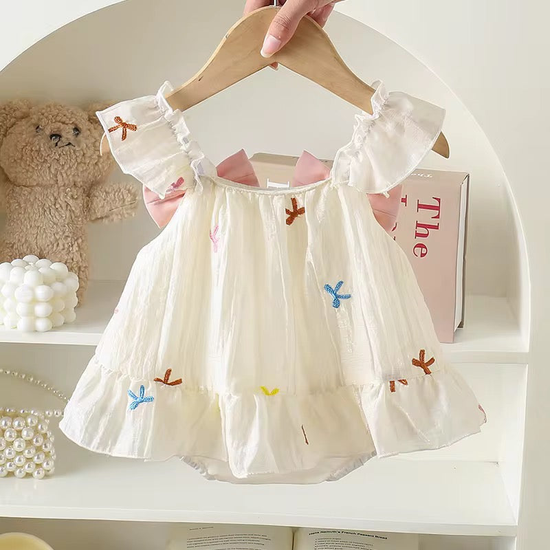 Vestido con moñitos
