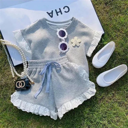Conjunto gris flor