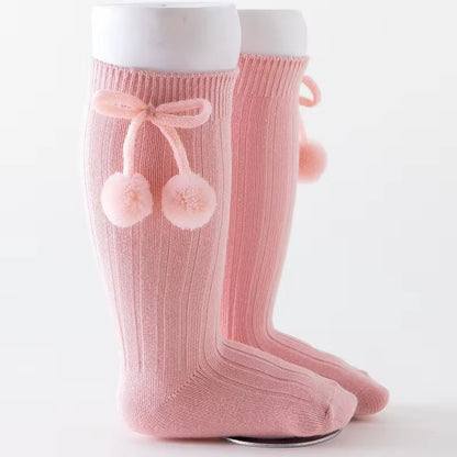 Calcetas con pompones