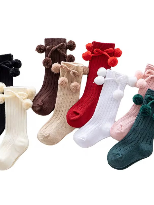 Calcetas con pompones