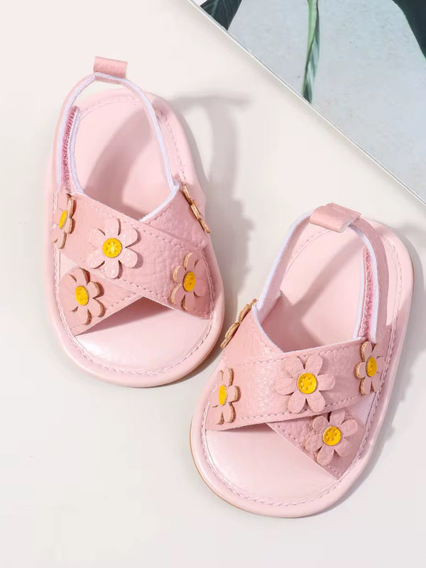 Sandalias florecitas rosas