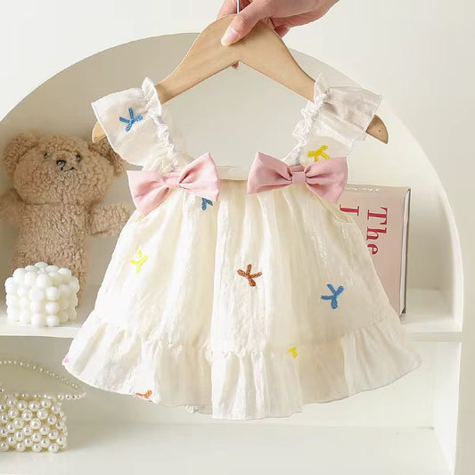 Vestido con moñitos