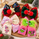 Colección de moños navideños para niña en 7 diseños
