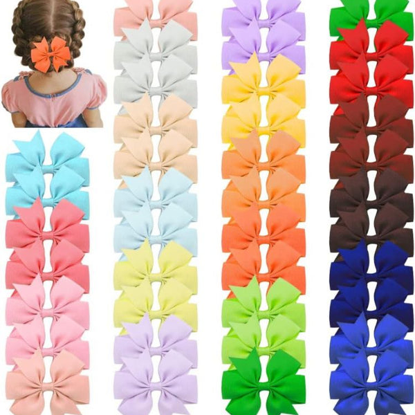 1 pz Moño chico color diverso