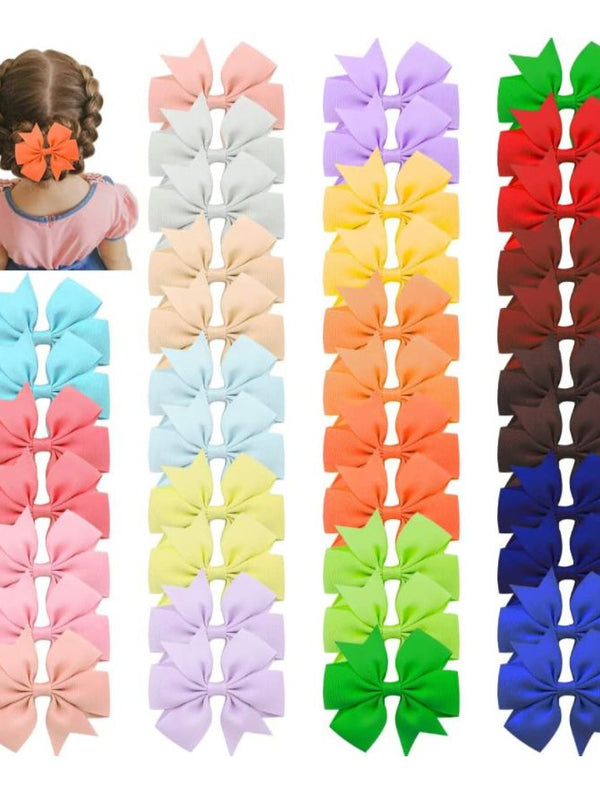 1 pz Moño chico color diverso