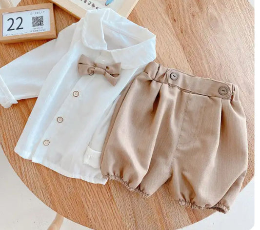 Conjunto camisa blanca con moño y short beige