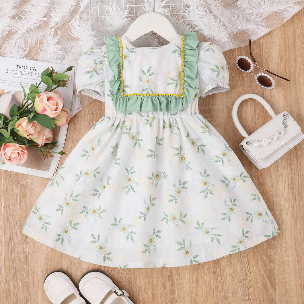 Vestido blanco con flores verdes