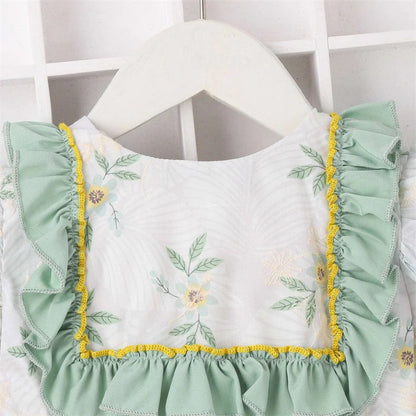 Vestido blanco con flores verdes